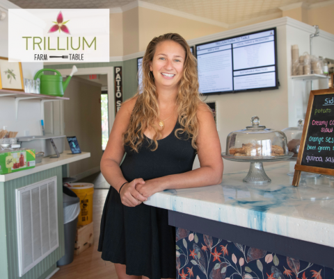 woman smiling inside trillium