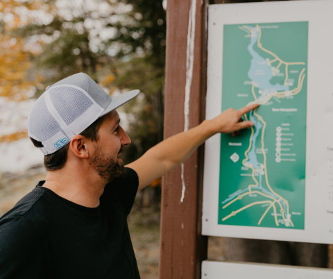 man looking at map